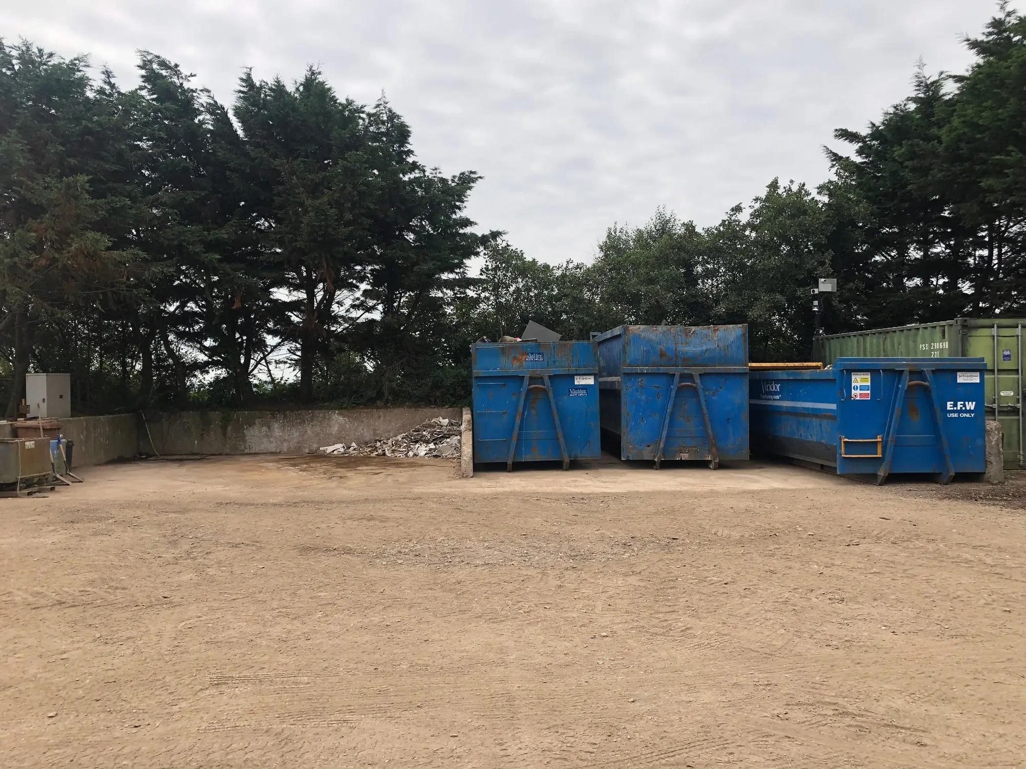 Blue recycling containers at the Dartmouth Midi Skips waste facility